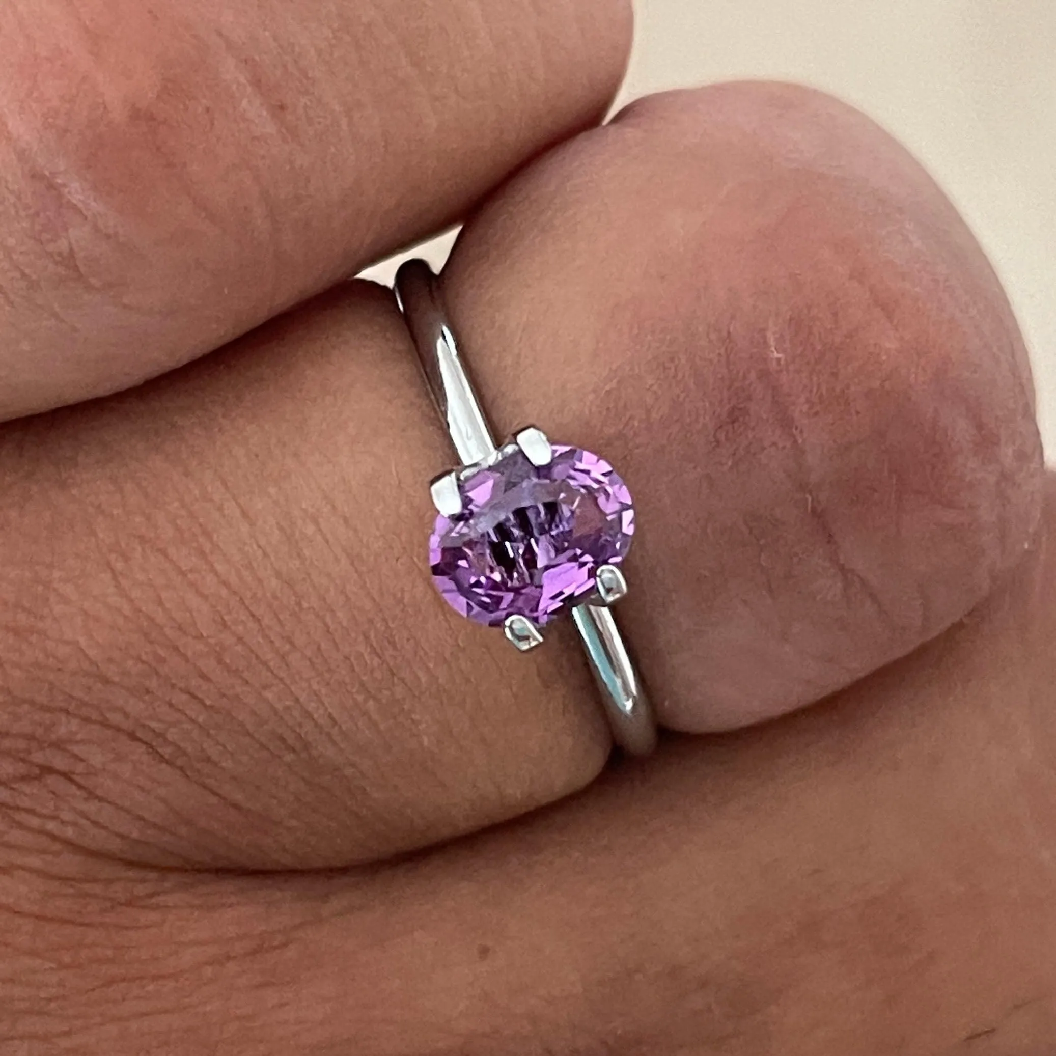 loose purple sapphire 1.10 crt purple pink sapphire online,  selling loose gemstones online for october birthstone jewelry as fiance ring, made to order engagement rings in new world gems selling loose gemstones online