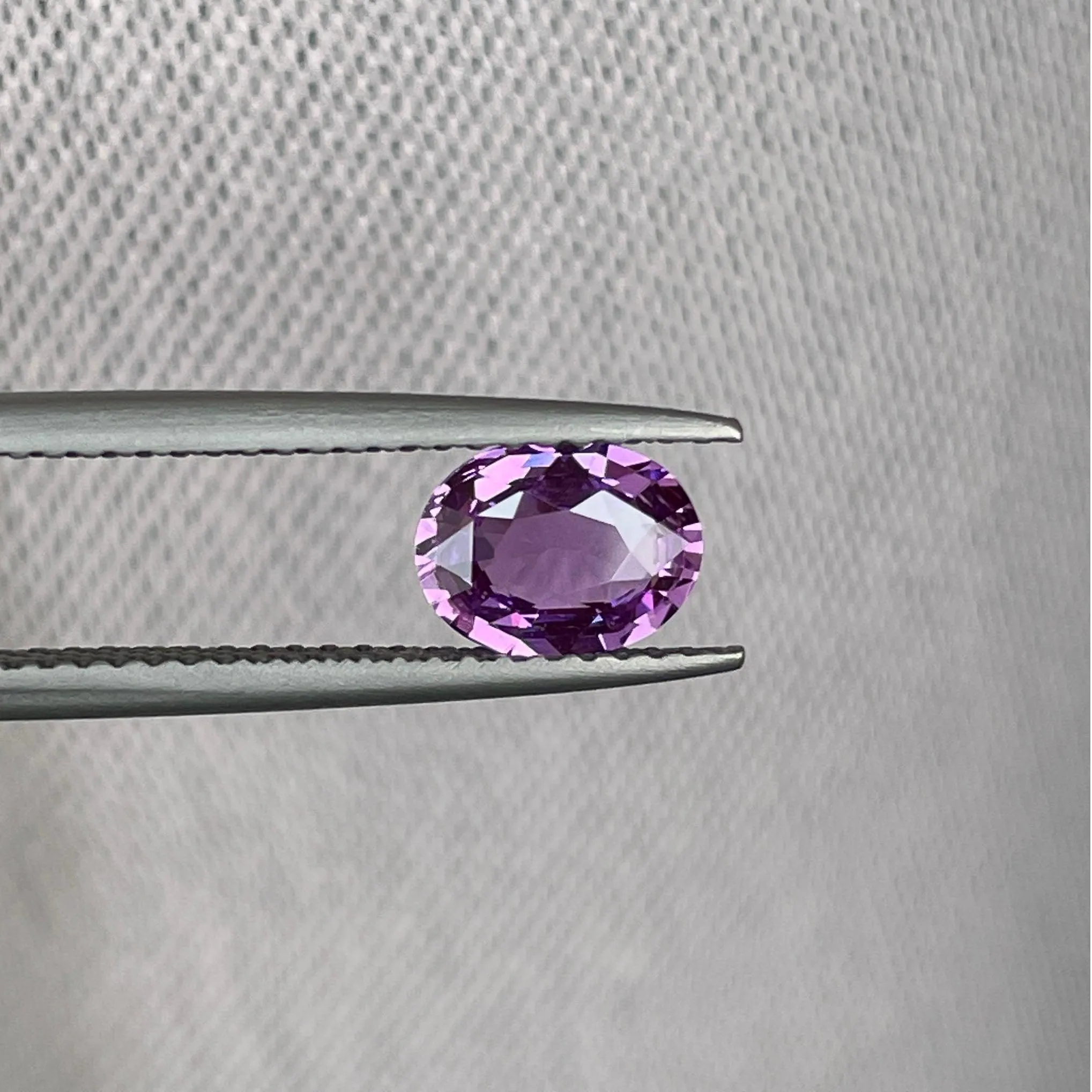 loose purple sapphire 1.10 crt purple pink sapphire online,  selling loose gemstones online for october birthstone jewelry as fiance ring, made to order engagement rings in new world gems selling loose gemstones online