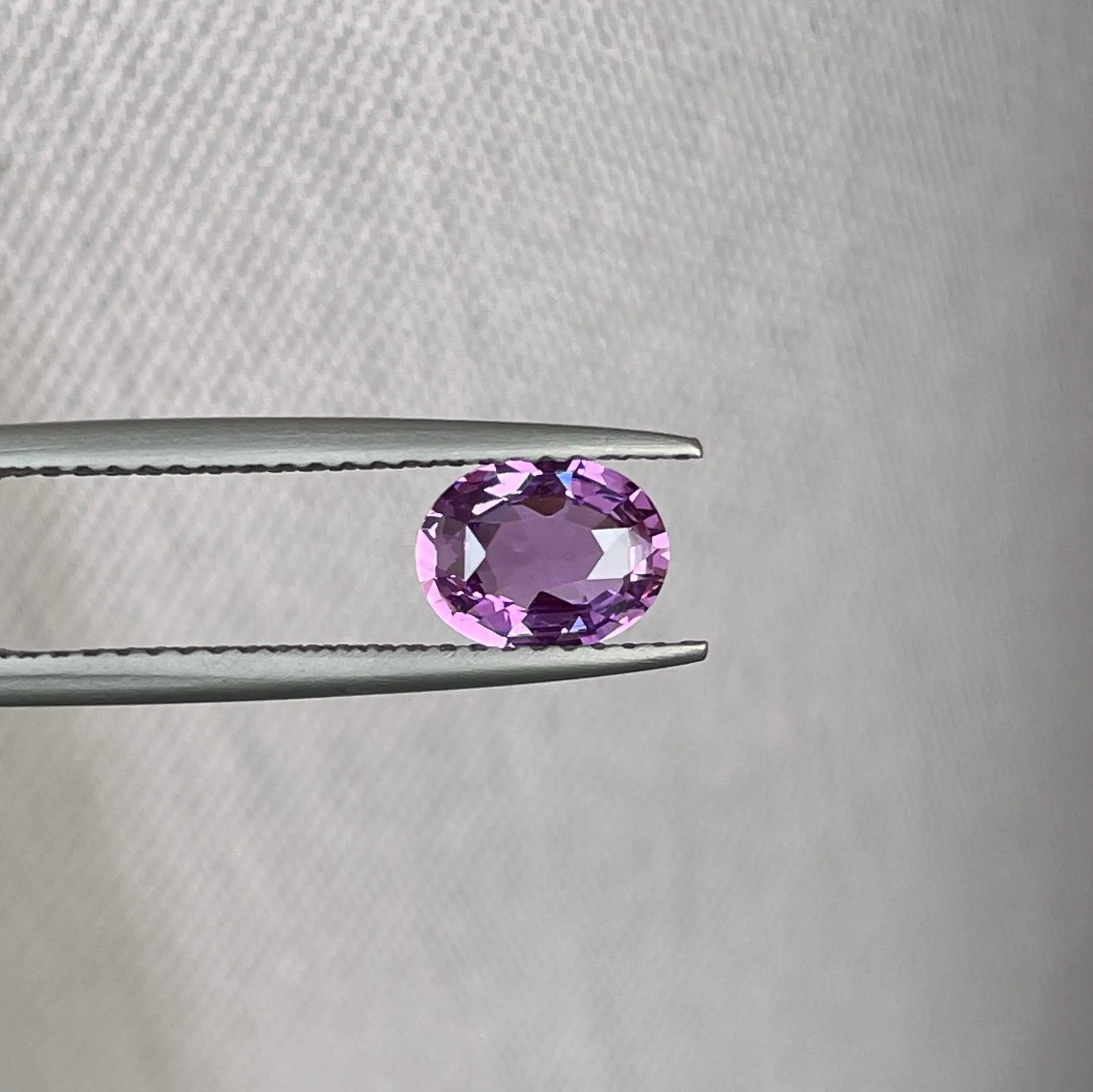 loose purple sapphire 1.10 crt purple pink sapphire online,  selling loose gemstones online for october birthstone jewelry as fiance ring, made to order engagement rings in new world gems selling loose gemstones online