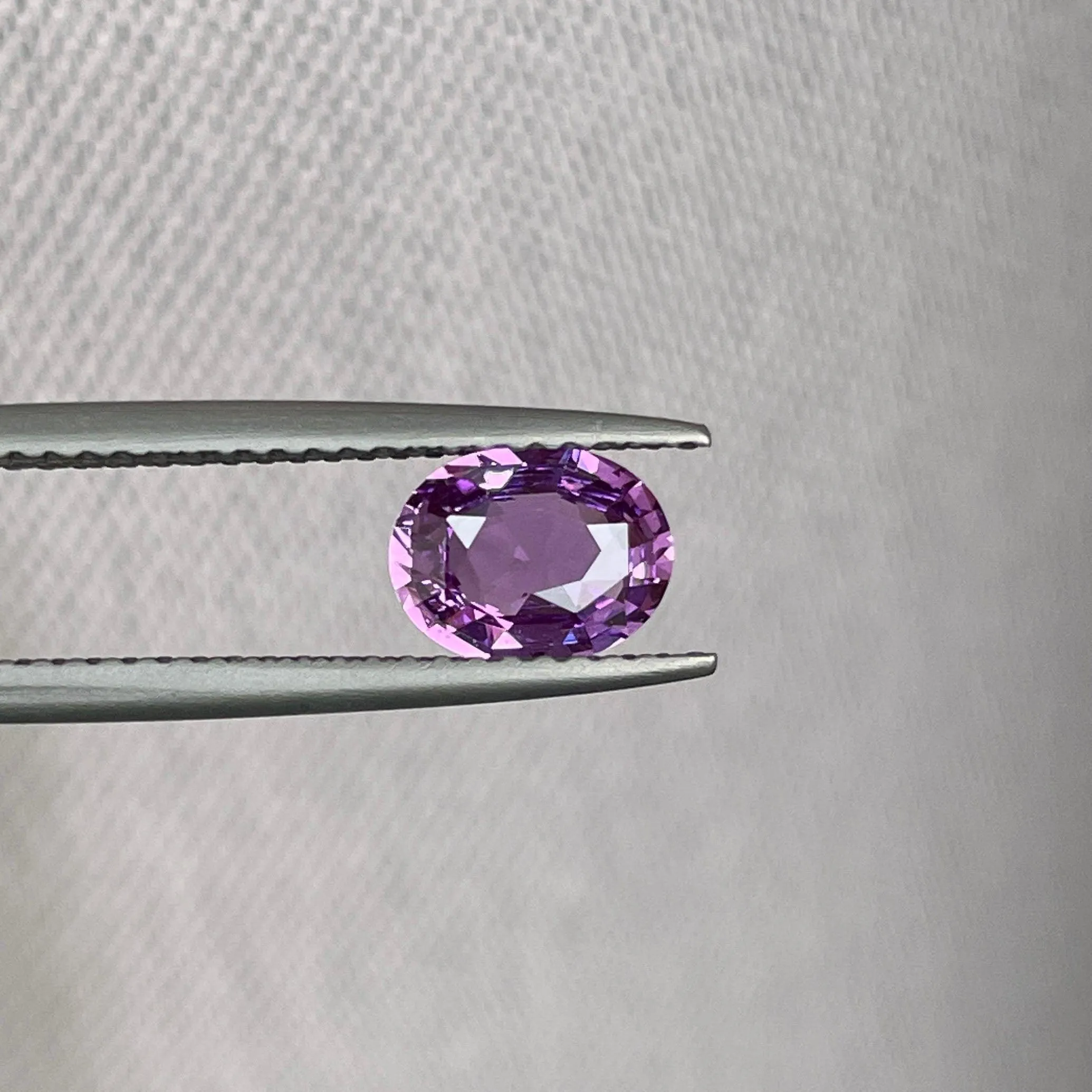 loose purple sapphire 1.10 crt purple pink sapphire online,  selling loose gemstones online for october birthstone jewelry as fiance ring, made to order engagement rings in new world gems selling loose gemstones online