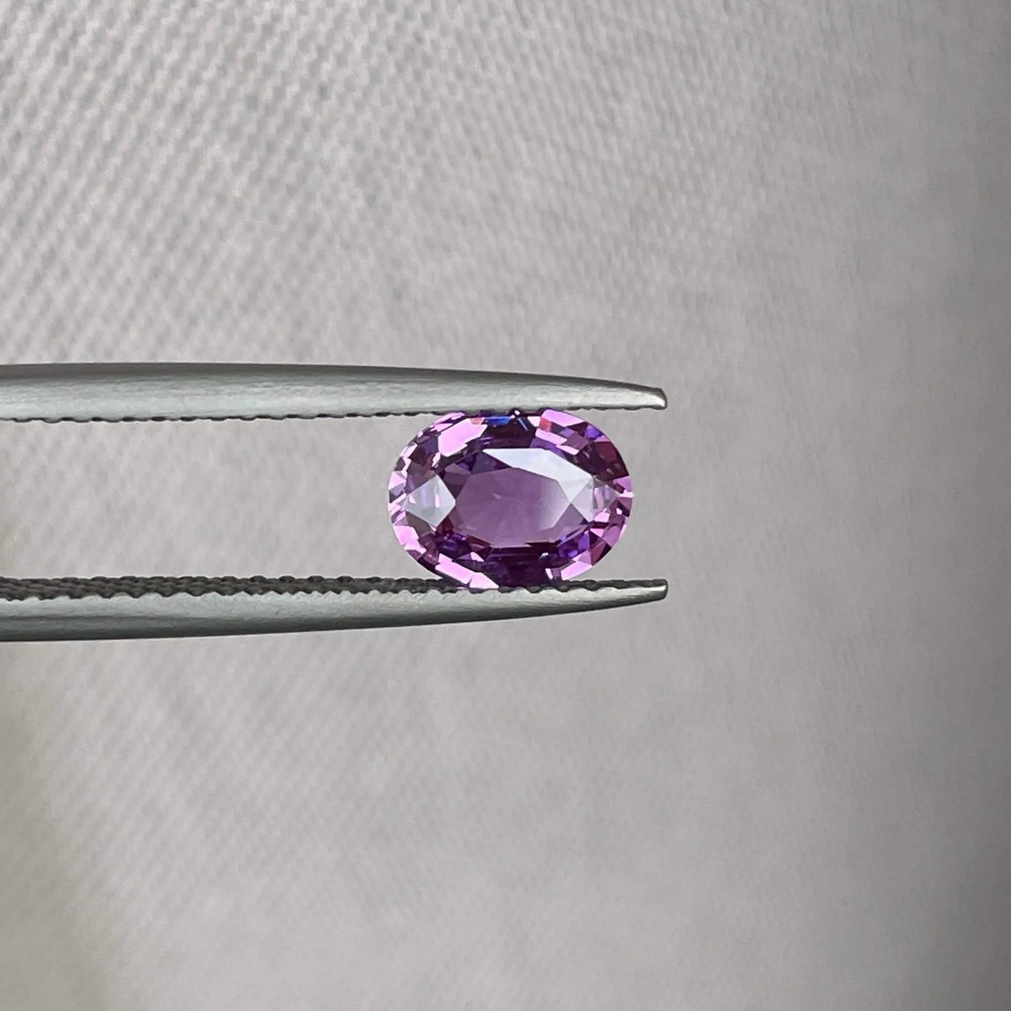 loose purple sapphire 1.10 crt purple pink sapphire online,  selling loose gemstones online for october birthstone jewelry as fiance ring, made to order engagement rings in new world gems selling loose gemstones online
