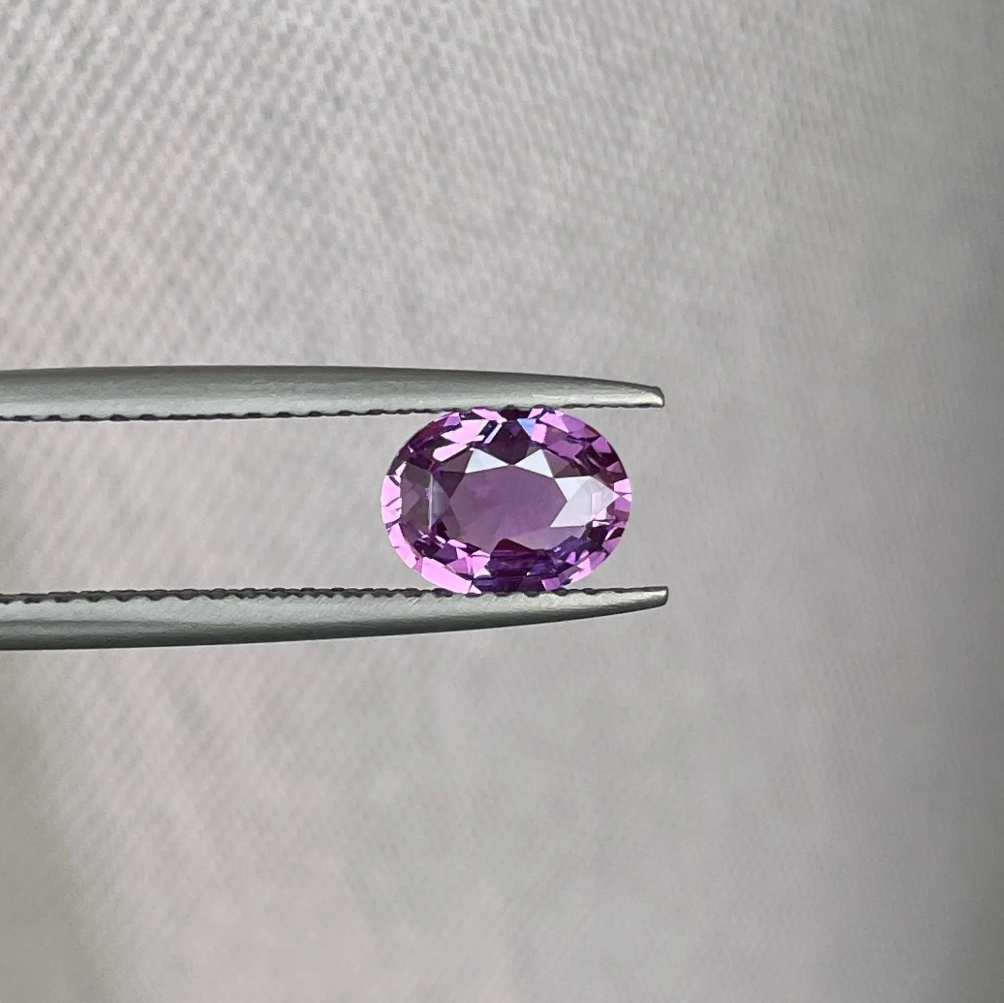 loose purple sapphire 1.10 crt purple pink sapphire online,  selling loose gemstones online for october birthstone jewelry as fiance ring, made to order engagement rings in new world gems selling loose gemstones online